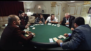 Kolpaçino Private Poker Game Scene with Men in Suits Around Green Felt Table HD wallpaper