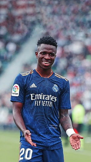 Vinicius Junior in Real Madrid Away Kit Smiling on the Pitch HD phone wallpaper