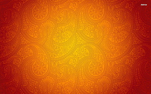 Vibrant Orange Paisley Pattern with Floral Motifs and Warm Gradient Background HD wallpaper