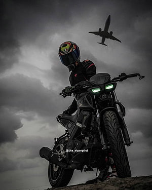 Yamaha MT-15 Black Motorcycle Rider Under Stormy Sky With Airplane HD phone wallpaper