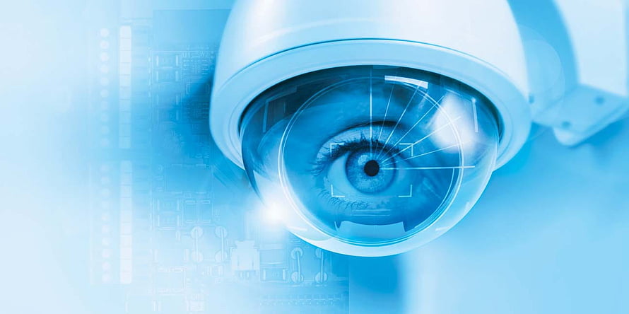 Blue Tinted CCTV Surveillance Camera with Human Eye and Digital Circuit Overlay HD wallpaper