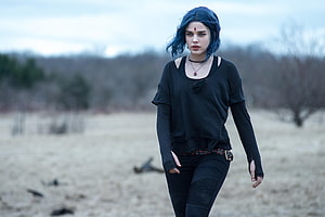 Raven from Titans Walking Through a Barren Field in Dark Outfit HD wallpaper