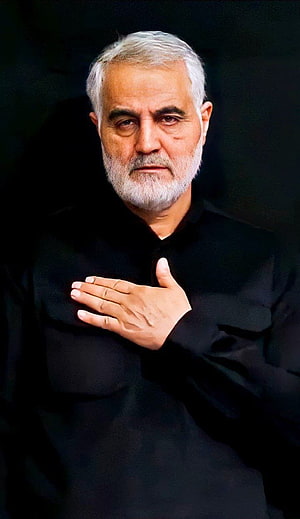 Qasem Soleimani Portrait in Black Attire with Hand on Chest HD phone wallpaper
