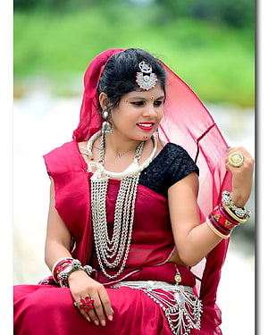 Adivasi Woman in Traditional Red Saree with Silver Jewelry and Tribal Headpiece HD phone wallpaper