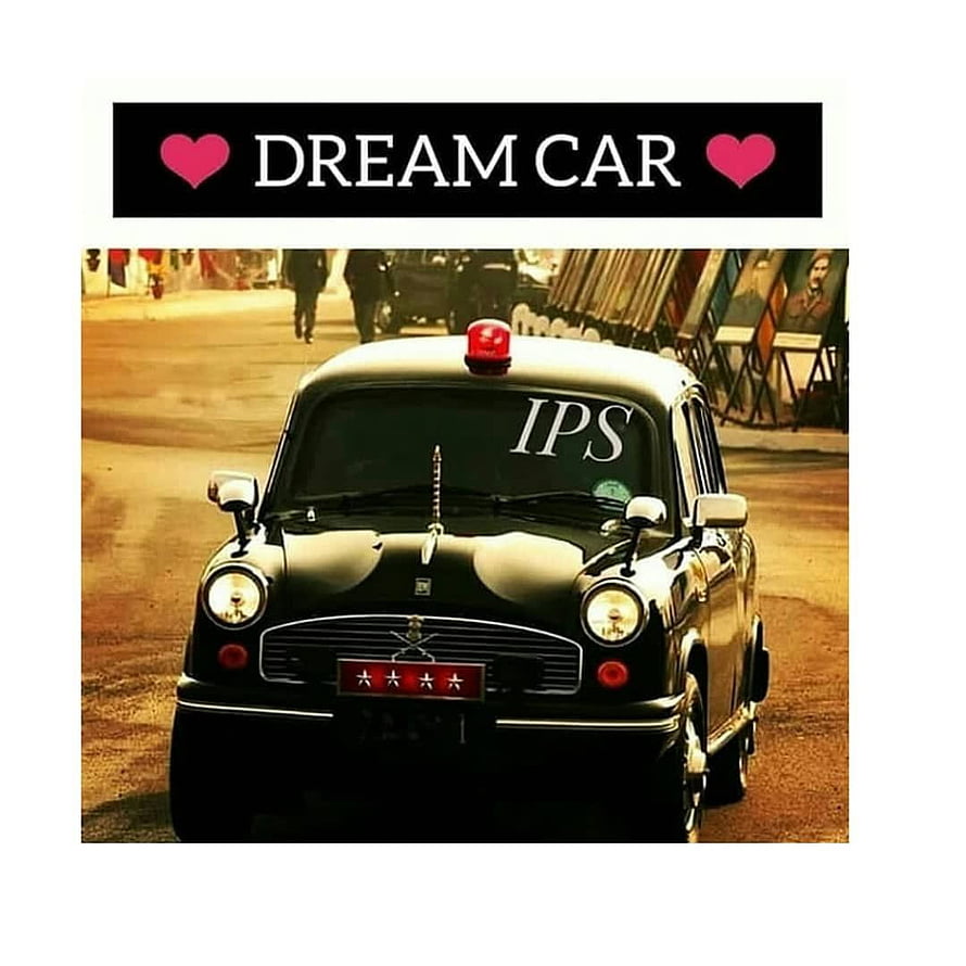 Vintage Black IPS Police Car with Red Light on Dusty Street HD phone wallpaper