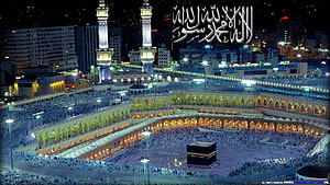 Aerial Night View of the Kaaba and Grand Mosque in Mecca with Pilgrims HD wallpaper