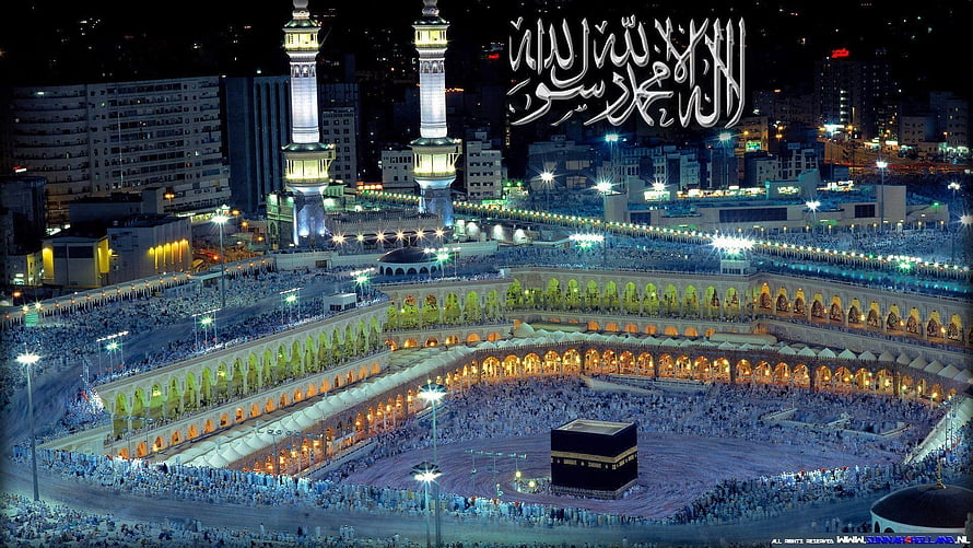Aerial Night View of the Kaaba and Grand Mosque in Mecca with Pilgrims HD wallpaper
