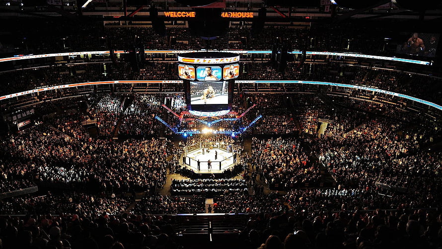 UFC Mixed Martial Arts Event Inside a Packed Indoor Arena with Central Octagon Cage HD wallpaper