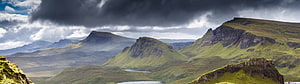 Dramatic Highland Landscape with Rolling Green Hills and Stormy Skies HD wallpaper