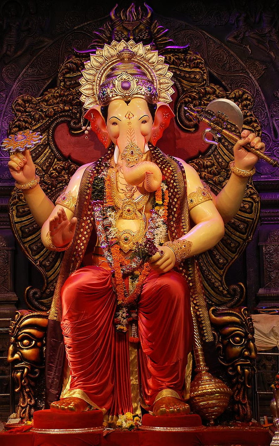 Lalbaugcha Raja Ganesha Murti in Ornate Temple Setting with Red Drape and Gold Crown HD phone wallpaper
