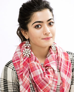 Rashmika Mandanna Portrait Wearing Pink Plaid Scarf and Ornate Jhumka Earrings HD phone wallpaper