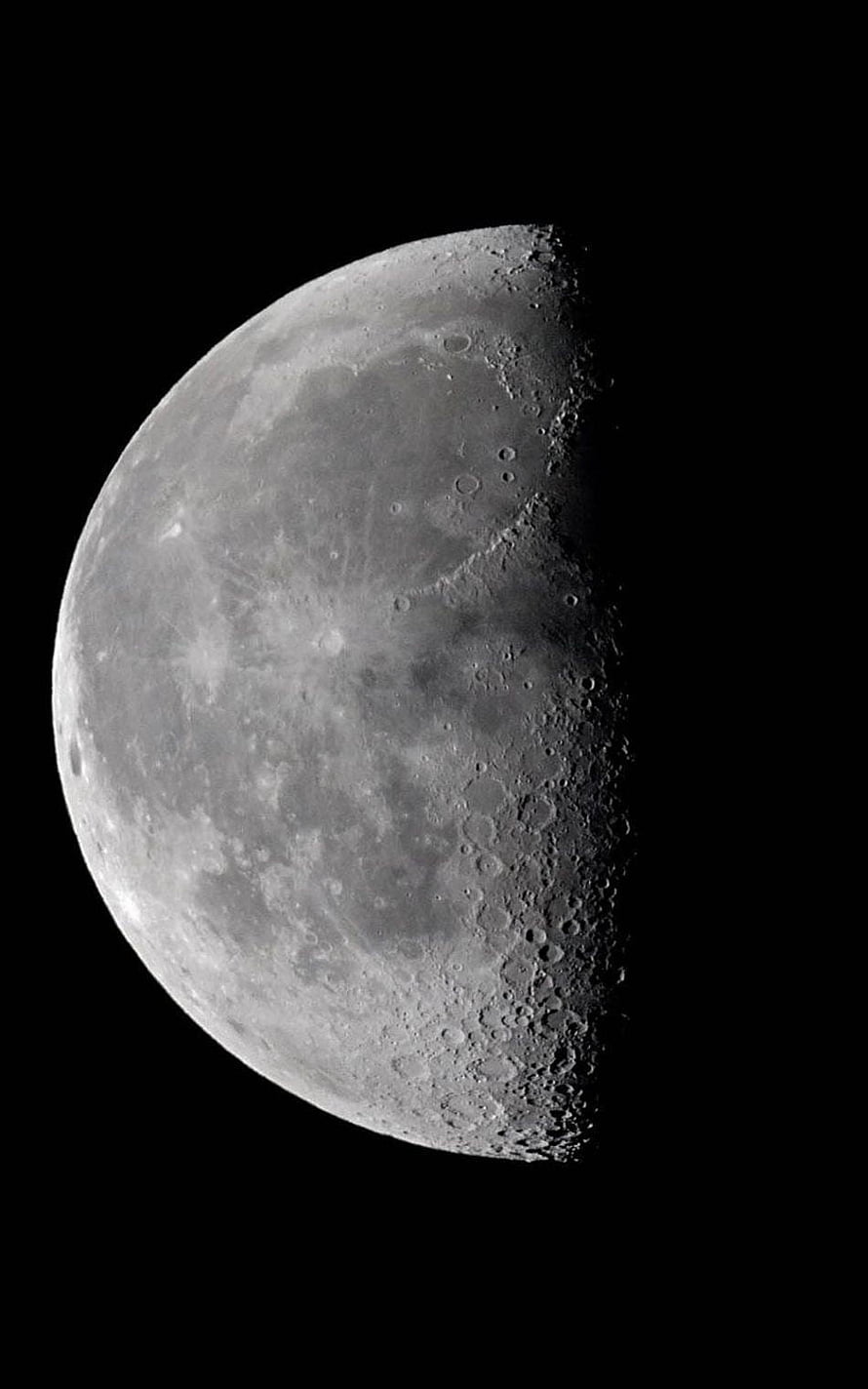 Half Moon Phase with Cratered Surface and Dark Space Background HD phone wallpaper