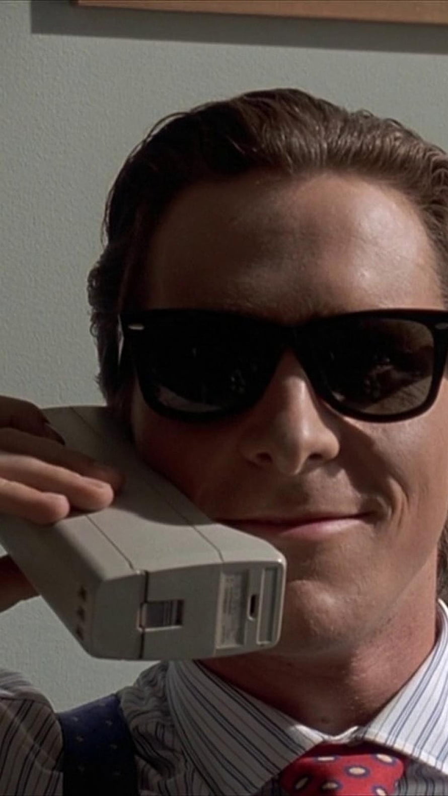 Patrick Bateman in Sunglasses Holding a Classic Brick Phone, patrick bateman HD phone wallpaper