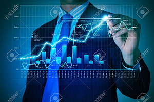 Businessman Analyzing Financial Growth Charts and Market Data on Digital Display HD wallpaper