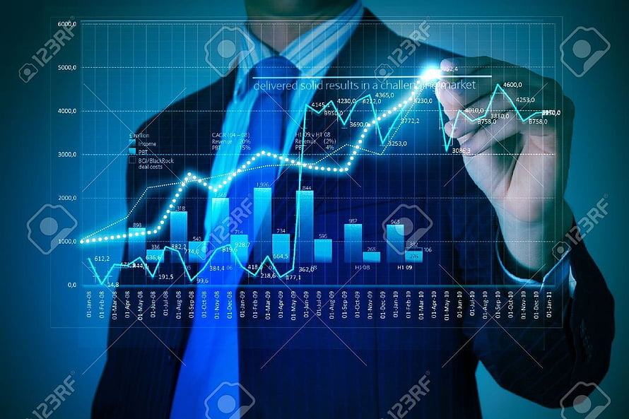Businessman Analyzing Financial Growth Charts and Market Data on Digital Display HD wallpaper