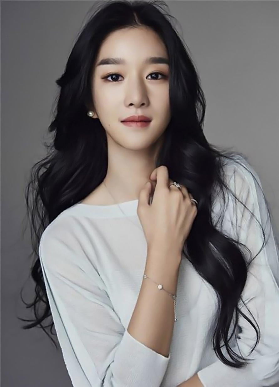 Seo Ye Ji Elegant Portrait in White Top with Long Dark Hair and Pearl Earrings HD phone wallpaper