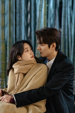 Kim Go Eun and Lee Min Ho in an intimate embrace from The King: Eternal Monarch HD phone wallpaper