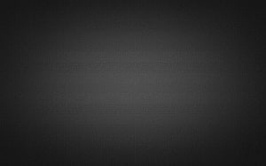 Minimalist Dark Grey Gradient Background with Subtle Vignette and Soft Center Glow HD wallpaper