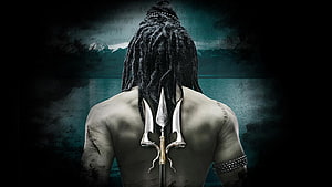 Lord Shiva Back View With Trident And Dreads Against Dark Teal Misty Landscape HD wallpaper