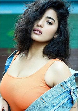 Ketika Sharma in Orange Tank Top and Denim Jacket Portrait HD phone wallpaper