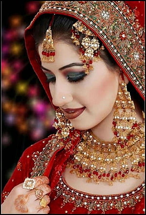 Elegant Indian Bride in Traditional Red Lehenga with Gold Jewelry and Henna HD phone wallpaper