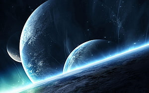 Majestic Blue Planets and Celestial Bodies in Deep Space HD wallpaper