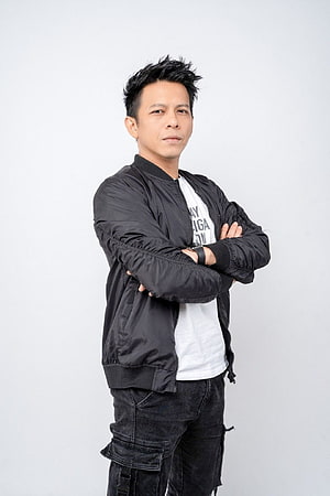 Ariel Noah in Black Bomber Jacket and Cargo Pants Studio Portrait HD phone wallpaper
