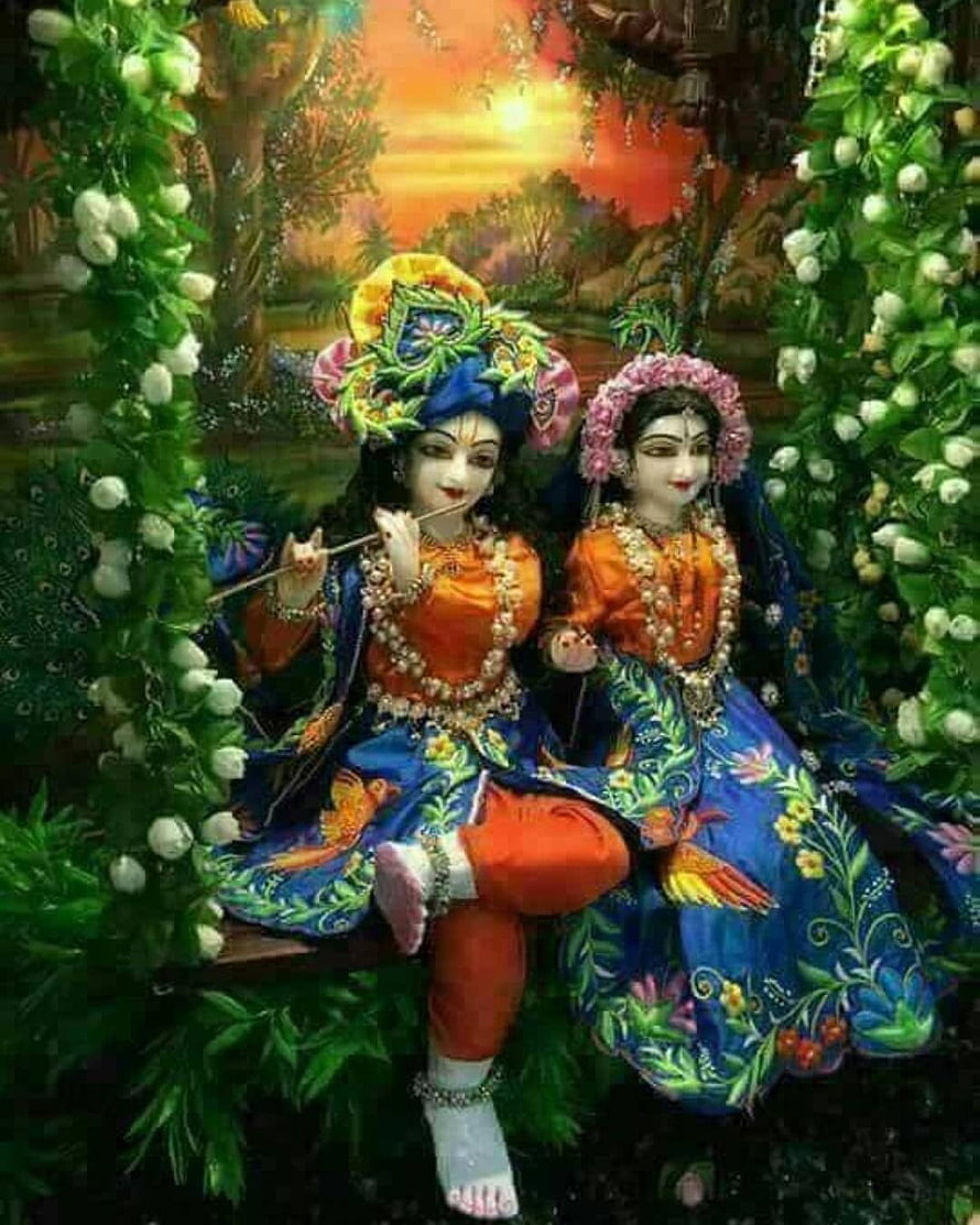 Radha Krishna Playing Flute on a Swing in a Lush Garden at Sunset HD phone wallpaper