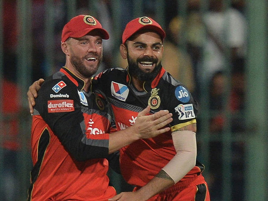 Virat Kohli and Ben Cutting Celebrate in Royal Challengers Bangalore Red Jersey HD wallpaper