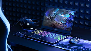 Acer Predator Helios 300 gaming laptop setup with RGB keyboard and headset on a dark desk HD wallpaper