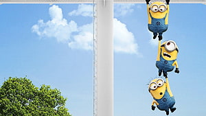 Three Minions Hanging in a Chain Against a Bright Blue Sky with Fluffy Clouds HD wallpaper
