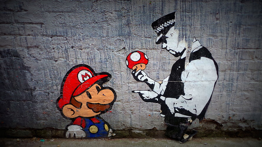 Banksy Street Art Mural Featuring Mario and a Policeman Offering a Mushroom HD wallpaper
