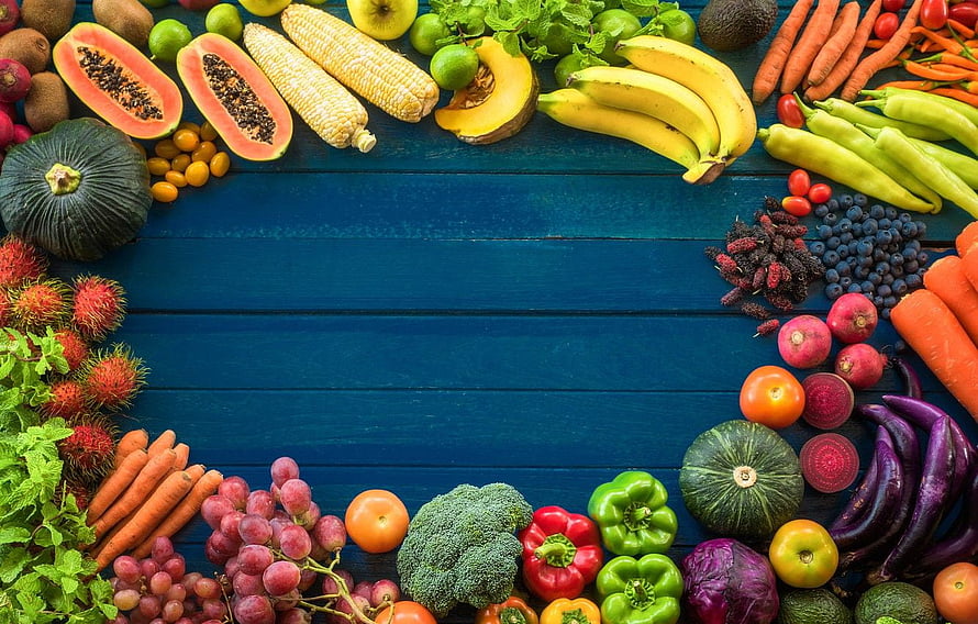 Colorful Fresh Fruits and Vegetables Arranged on a Blue Wooden Surface HD wallpaper