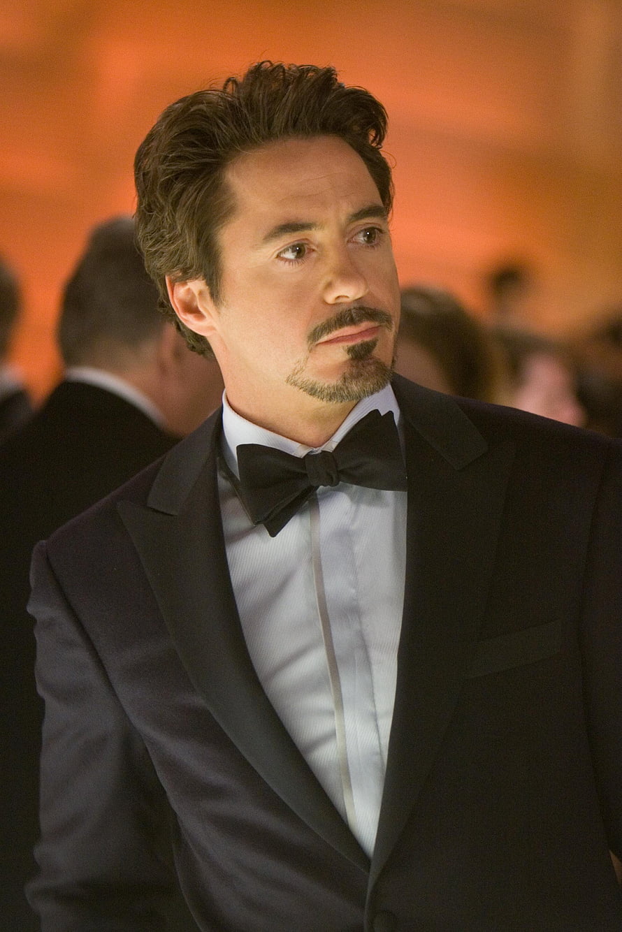 Robert Downey Jr as Tony Stark in a Black Tuxedo and Bow Tie at a Formal Gala Event HD phone wallpaper