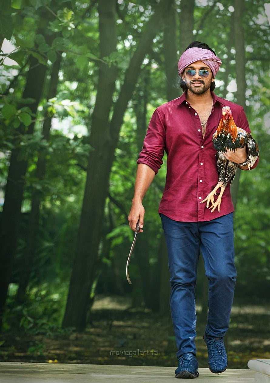 Ala Vaikunthapurramuloo promotional still featuring a man in a maroon shirt holding a rooster and a curved blade in a forest HD phone wallpaper
