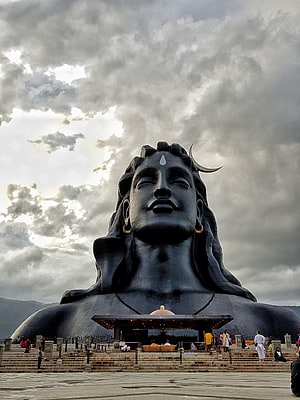 Adiyogi Bust at Isha Yoga Foundation Under Dramatic Cloudy Sky HD phone wallpaper