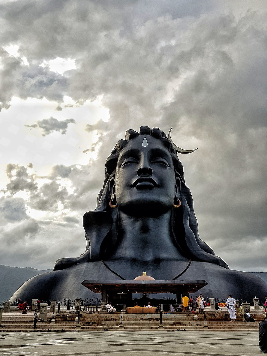 Adiyogi Bust at Isha Yoga Foundation Under Dramatic Cloudy Sky HD phone wallpaper
