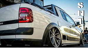White Volkswagen Saveiro Cross lowered with widebody kit and custom alloy wheels HD wallpaper