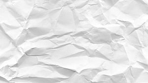 Crumpled White Paper Texture with Soft Shadows and Organic Folds HD wallpaper
