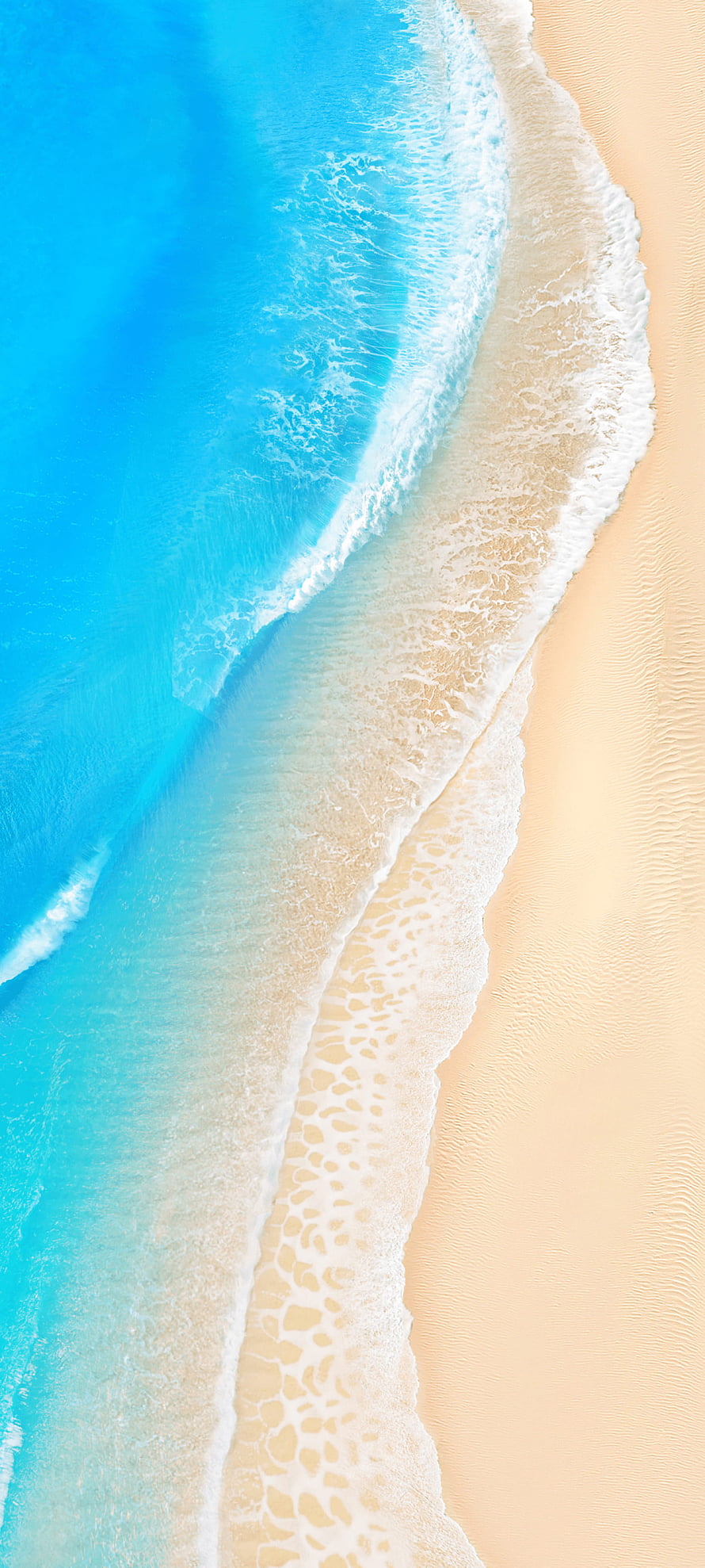 Aerial View of Turquoise Ocean Waves Lapping Against White Sandy Beach HD phone wallpaper
