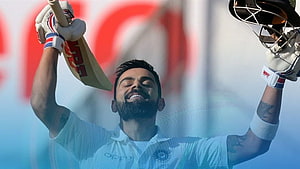Virat Kohli Celebrating Victory With Cricket Bat And Helmet Raised High HD wallpaper