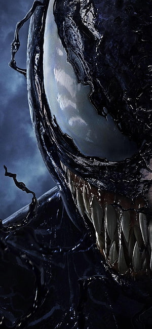Venom Close-Up Portrait with Glowing Eyes and Sharp Teeth in Dark Cinematic Style HD phone wallpaper