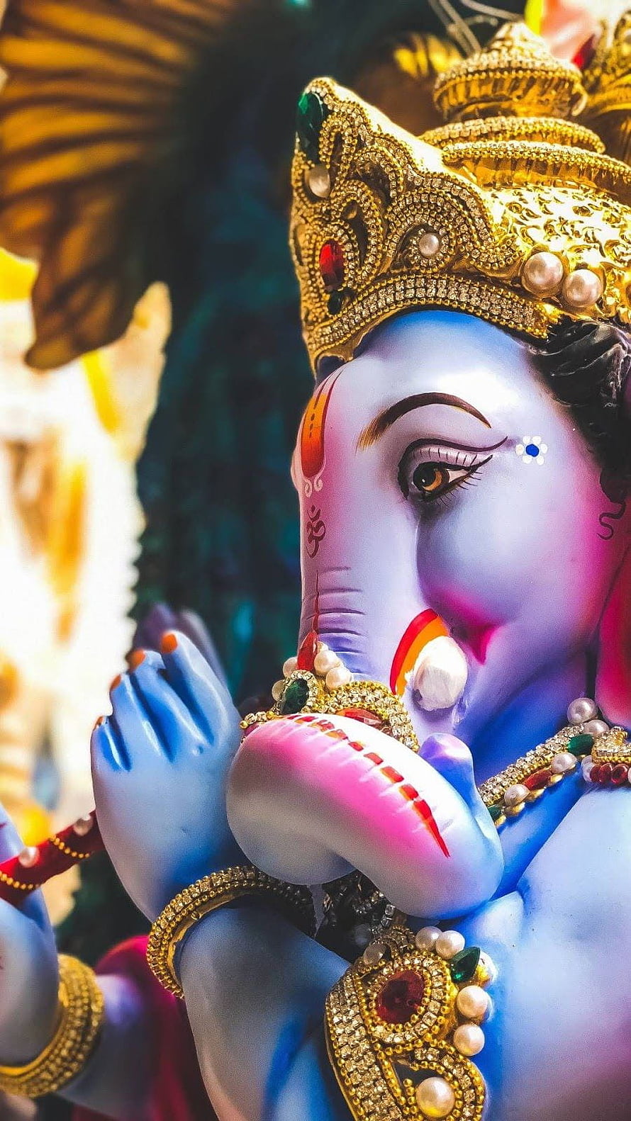 Ganesh Devotional Portrait with Golden Crown and Praying Hands HD phone wallpaper