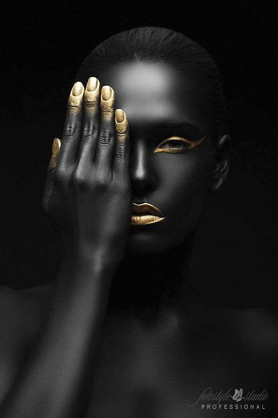 High-Contrast Black and Gold Editorial Beauty Portrait with Dramatic Hand Pose HD phone wallpaper