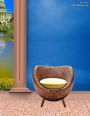 Woven Rattan Armchair with Cream Cushion Against Blue Wall and Garden View HD phone wallpaper