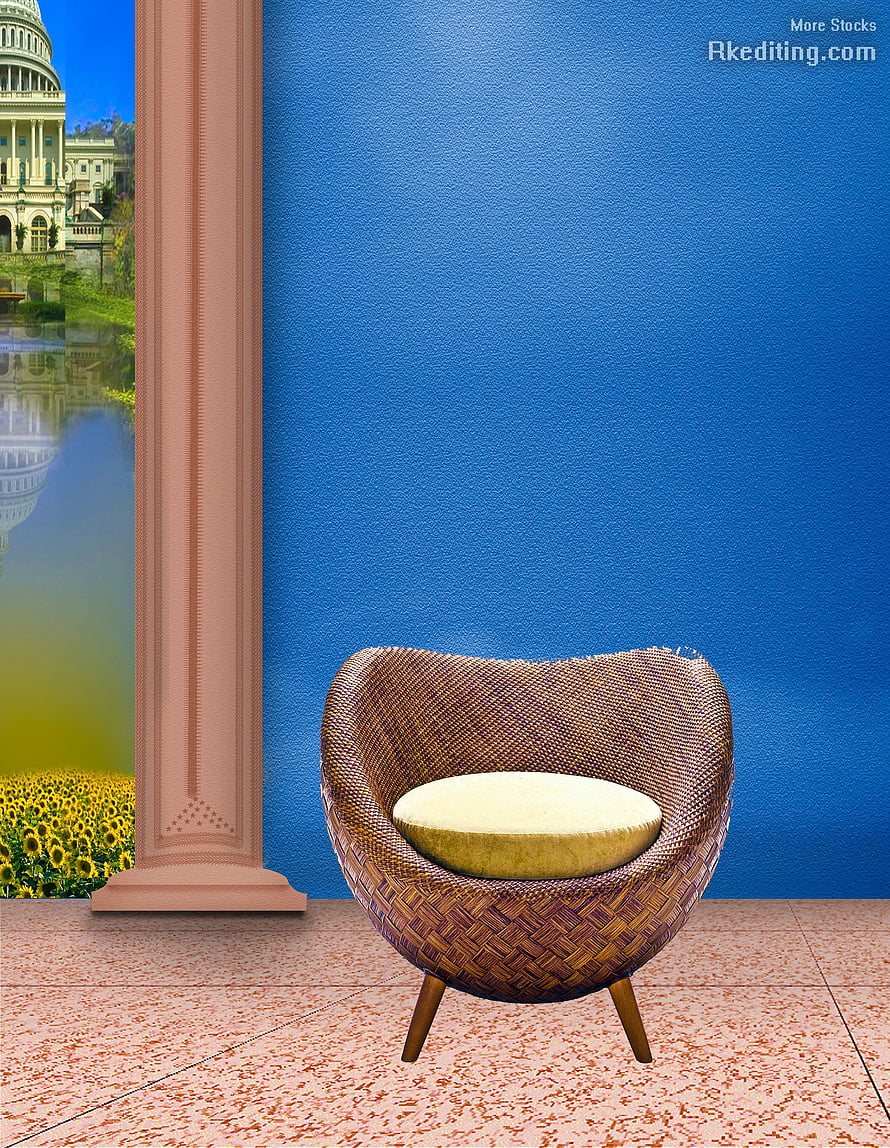 Woven Rattan Armchair with Cream Cushion Against Blue Wall and Garden View HD phone wallpaper