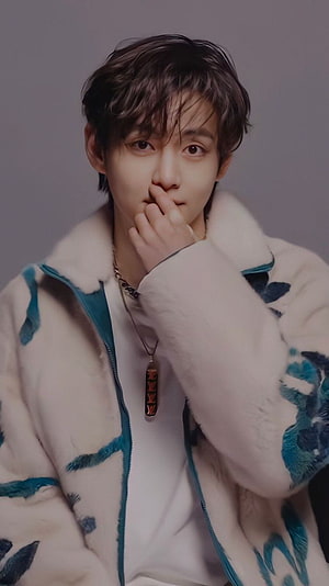 BTS V in a white and teal patterned fleece jacket with a pendant necklace HD phone wallpaper