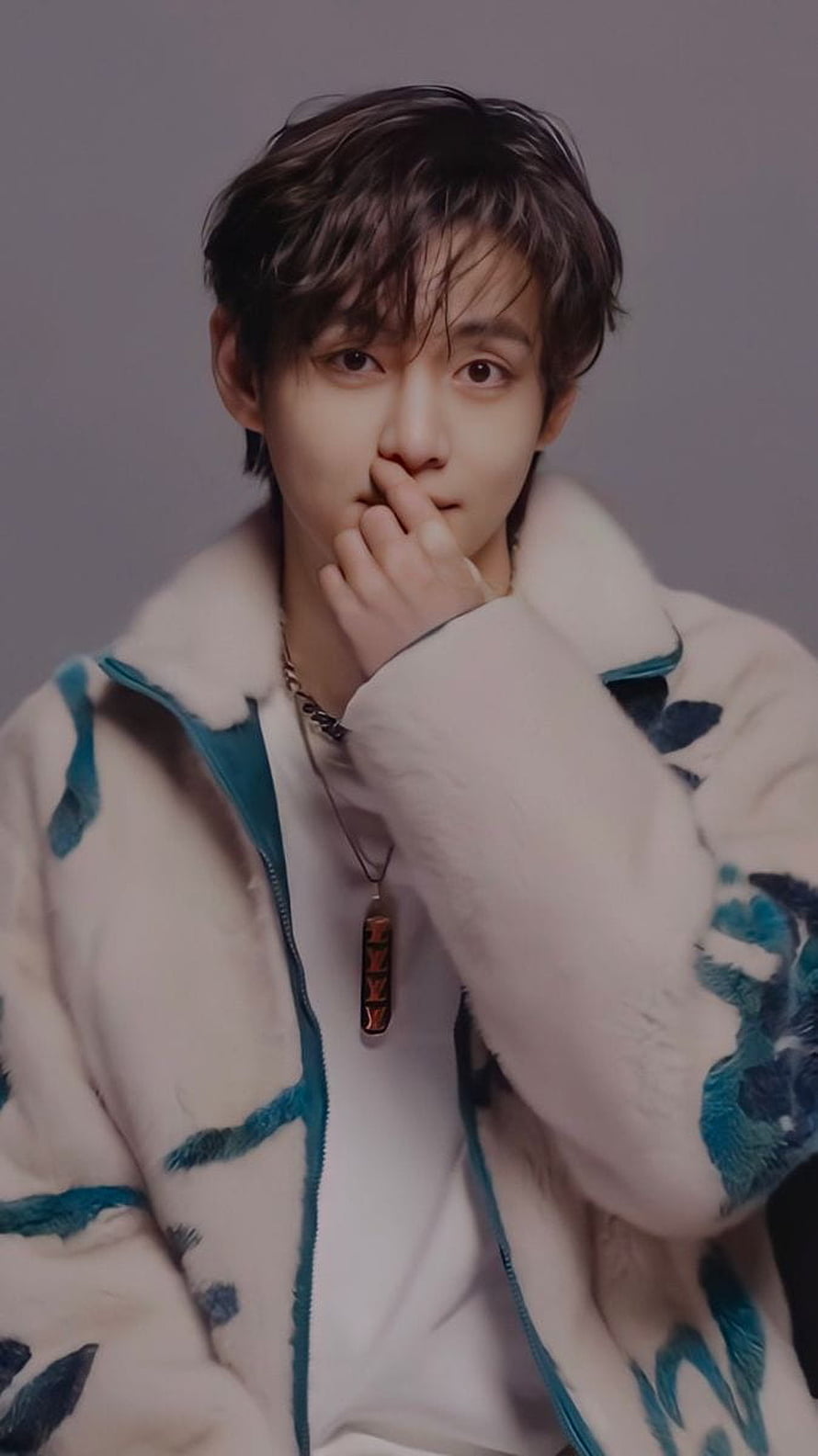 BTS V in a white and teal patterned fleece jacket with a pendant necklace HD phone wallpaper