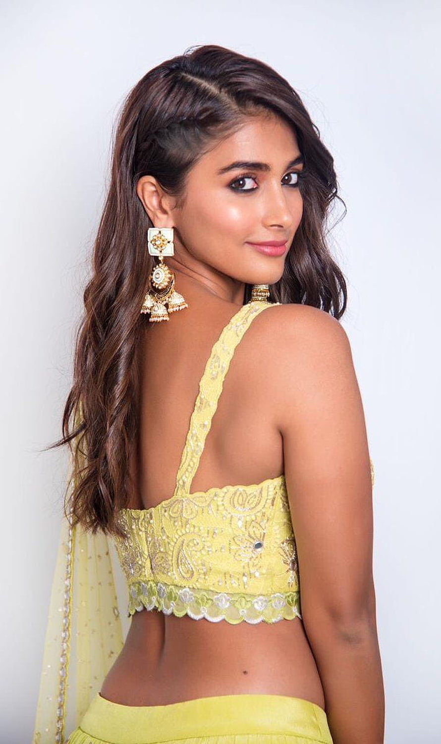 Pooja Hegde in Yellow Embroidered Lehenga Choli with Traditional Jhumka Earrings HD phone wallpaper