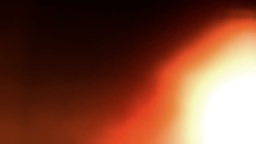 Warm Orange Light Leak Gradient with Soft White Glow on Dark Background HD wallpaper
